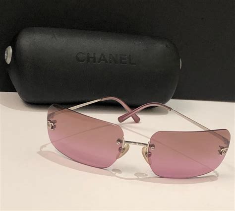 chanel rimless sunglasses pink|Chanel sunglasses pearl on side.